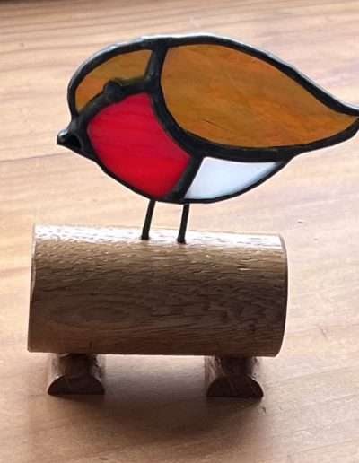 Little Robin on a wooden base