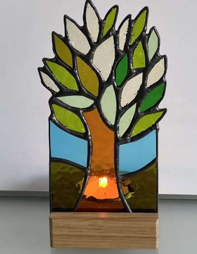 Stained glass tree of light tea light holder on wooden oak base