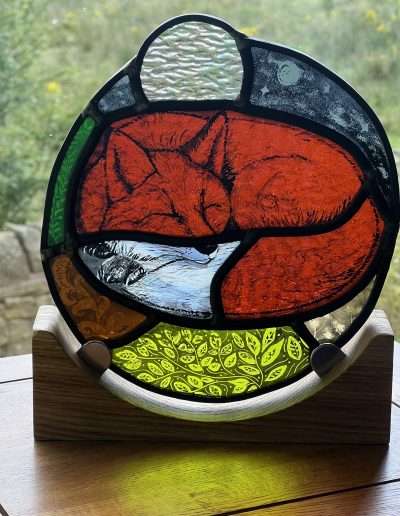 Painted Stained glass sleeping Fox on a wooden base