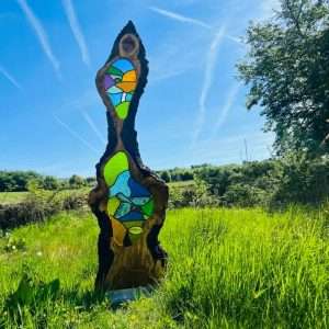 Stained glass and wood garden sculpture with kingfisher and fish hand painted details