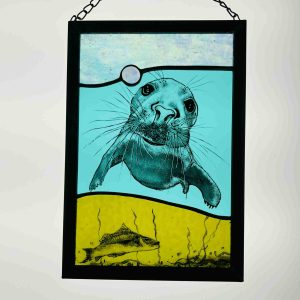 Grey seal and fish art panel with zinc frame and chain