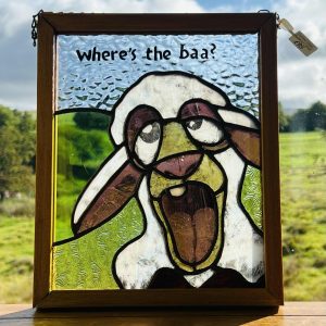Stained glass lamb asking 'where's the baa?' fun art panel.